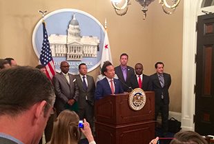 David Chiu speaks at a crowded press conference at the State Capitol