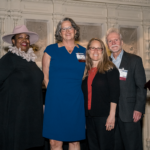 Three awardees from 2024 posing with Amie Fishman