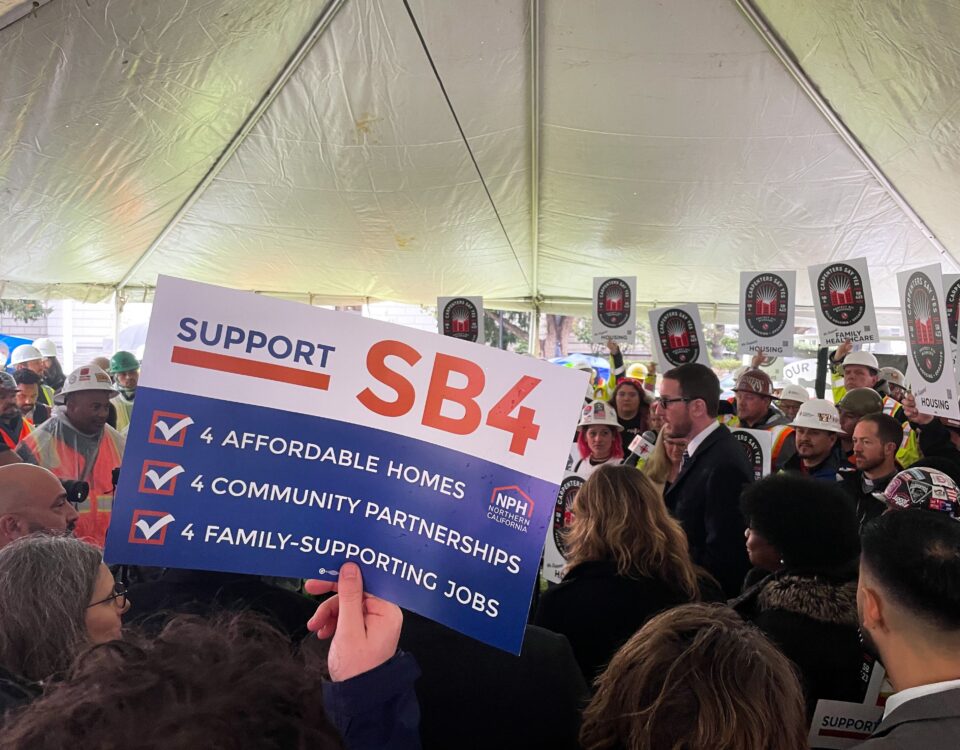 SB 4 rally with poster